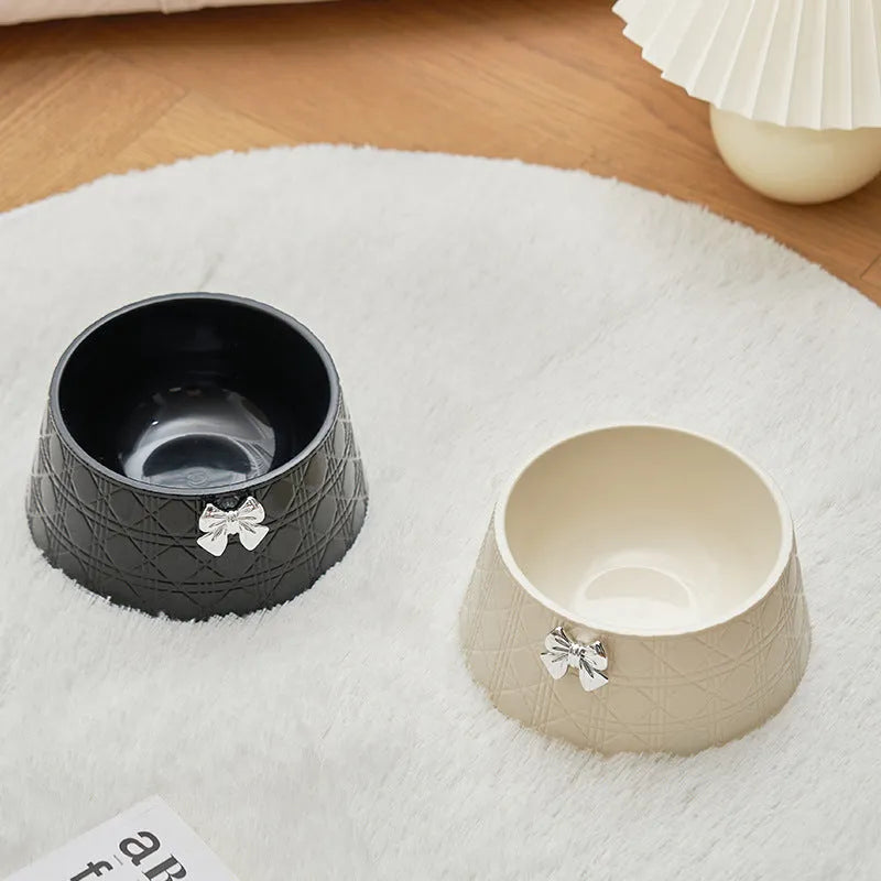 Ceramic pet bowl with diamond pattern and bow design in multiple colour options