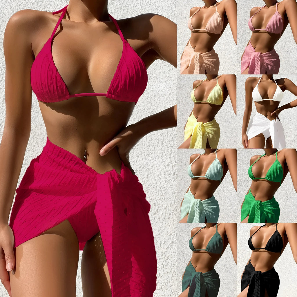 Women's black halterneck swimsuit set with mesh skirt shown on model