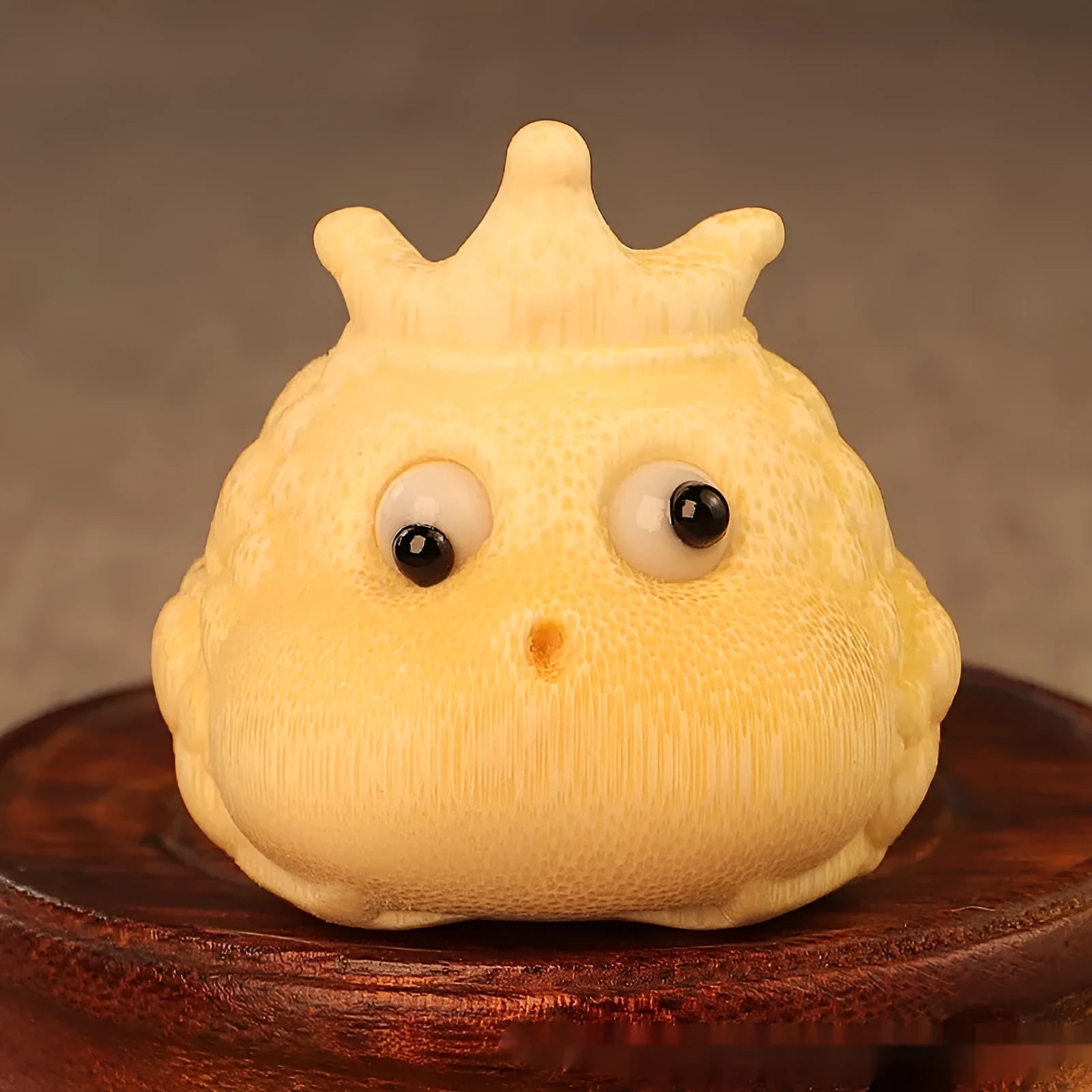 Solid bamboo carving of a cute Crown Princess Toad figurine, 5 cm in size.