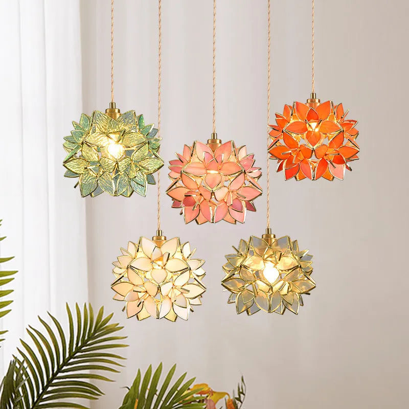 Stained glass hanging chandelier with copper fitting, shown in one of its blue, orange, pink, white or transparent colour options.