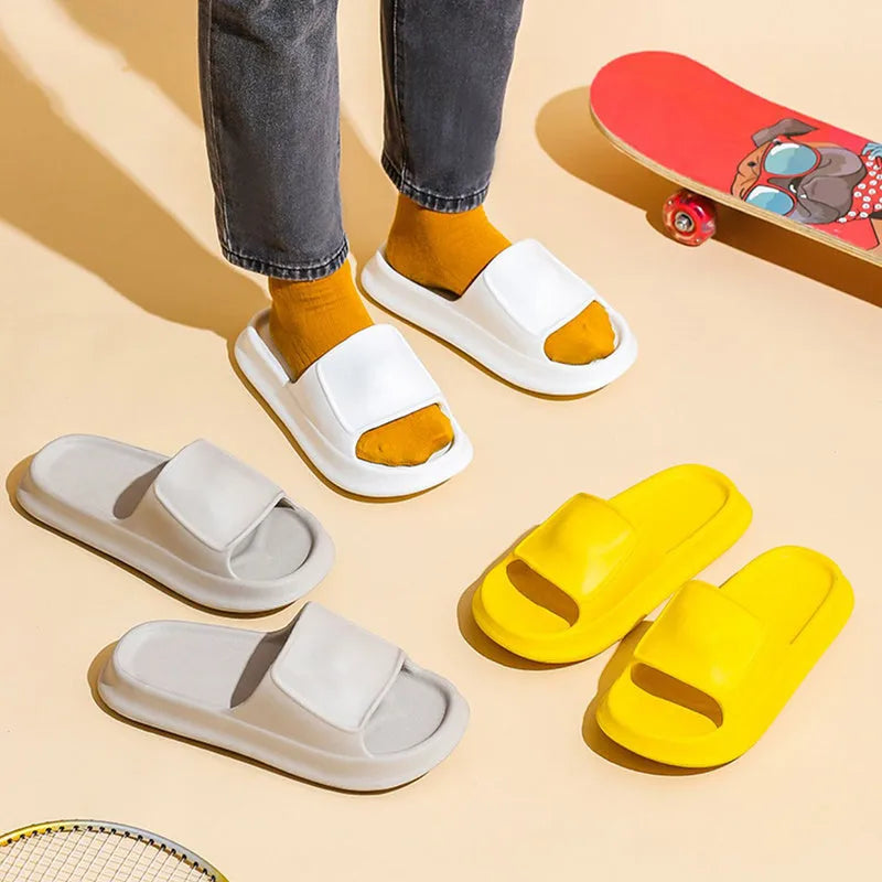 Soft EVA flip-flop slippers in multiple colours on a white background, showing thick sole and non-slip pattern.