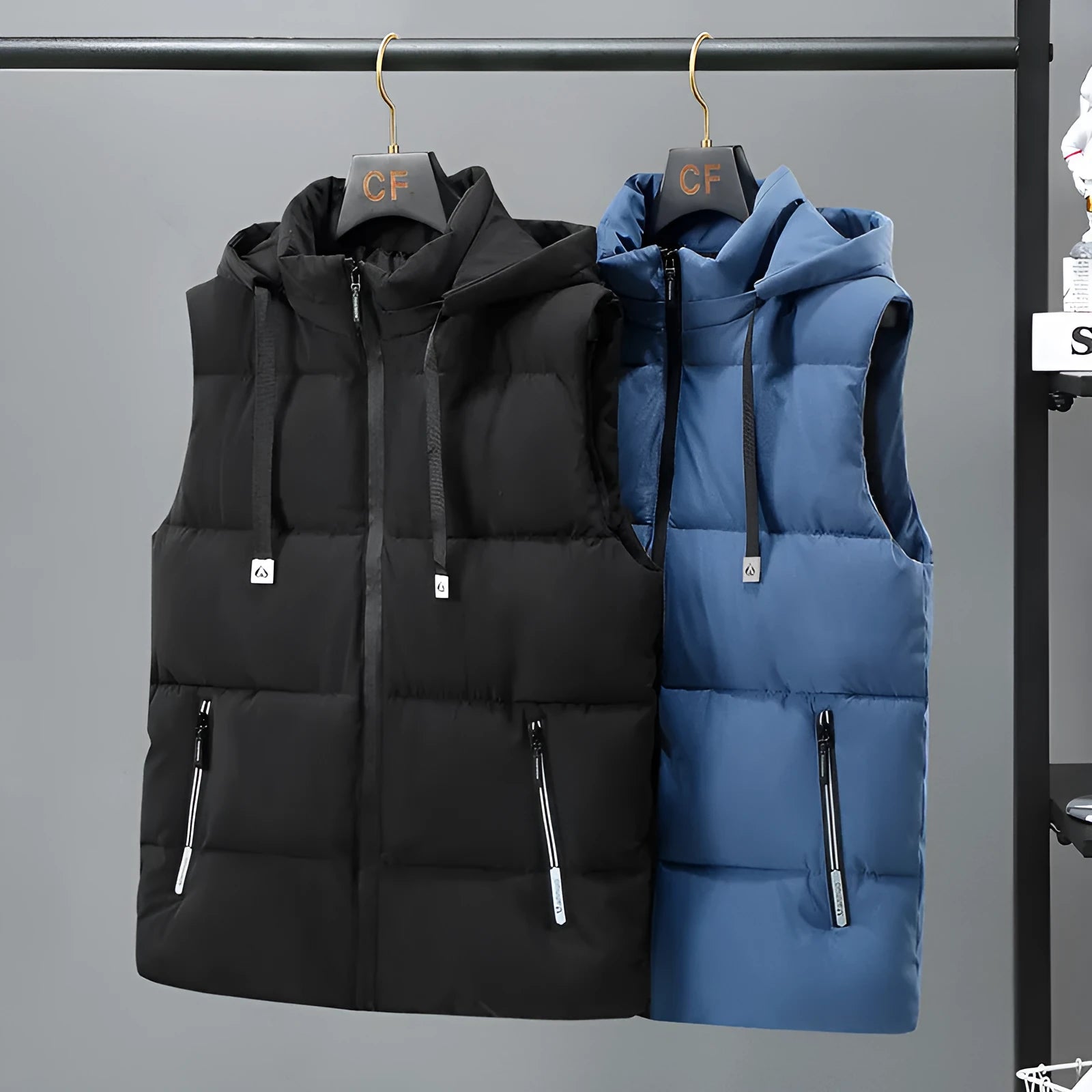 Men's black thickened polyester vest with a removable hood and zipper pockets.