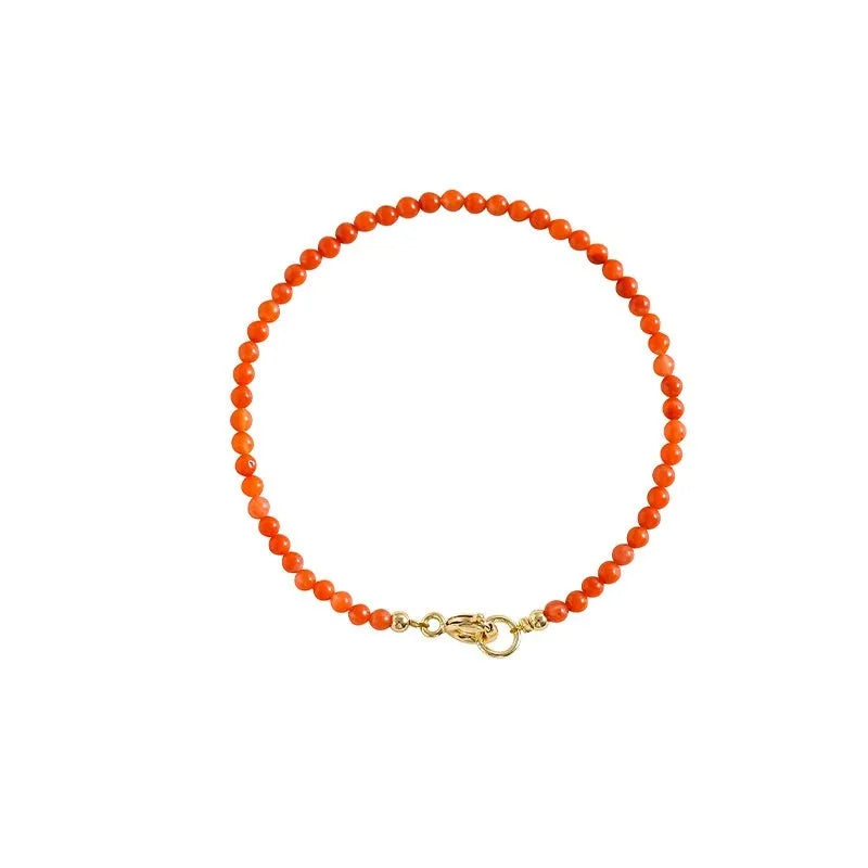 Women's retro-style bracelet featuring a polished natural southern red agate stone on a band, shown in cherry red and persimmon red colour variants.