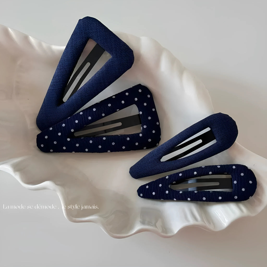 French retro dot pattern barrettes in triangle and water drop shapes with dark denim or polka dot designs