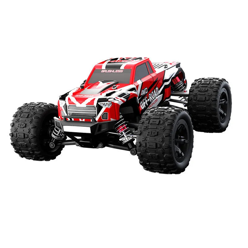 Four-wheel drive brushless remote control car in black with orange wheels on rough ground