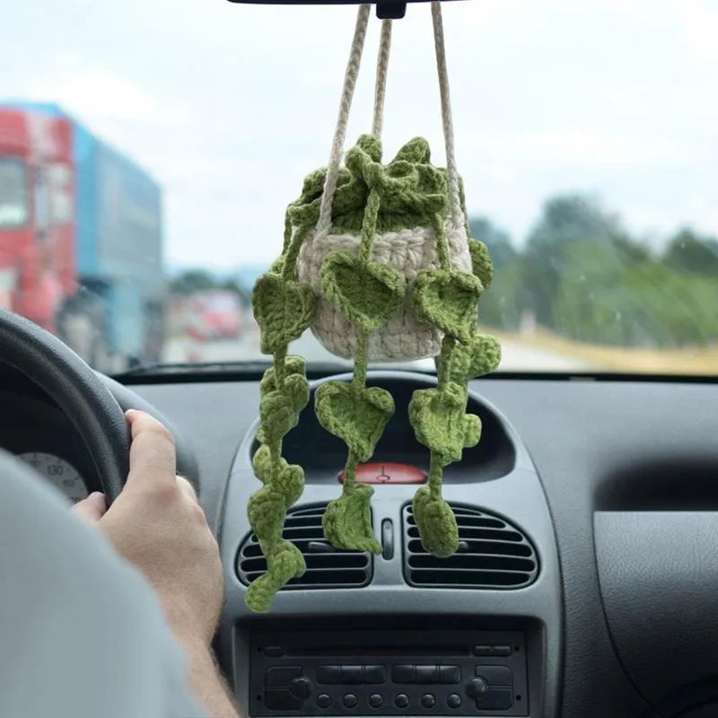 Green and white knitted wool plant ornament for car dashboard with hanging cord