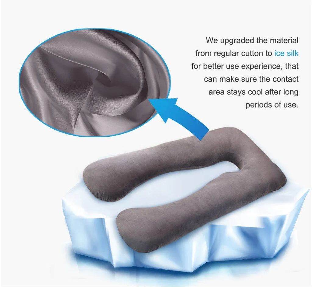 U-shaped white maternity pillow with ice silk cover on a bed, showing its full-body support shape for pregnancy.