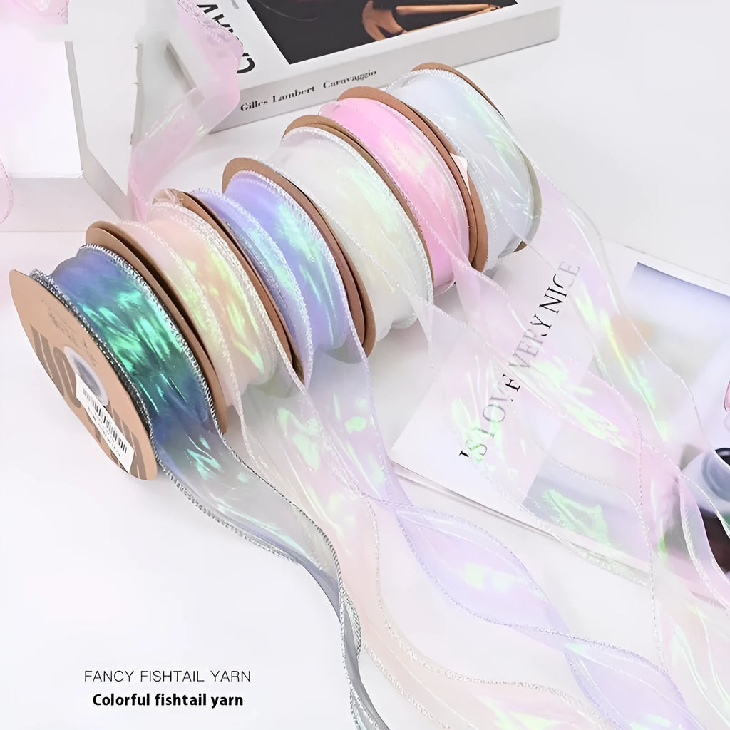 Roll of 4cm wide fishtail yarn ribbon with colourful wave pattern in multiple illusion colour options.