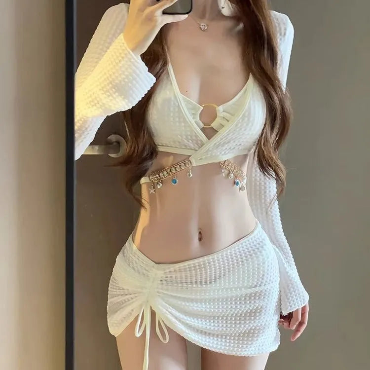 Women's long sleeve black and white bikini swimsuit made from polyester fabric