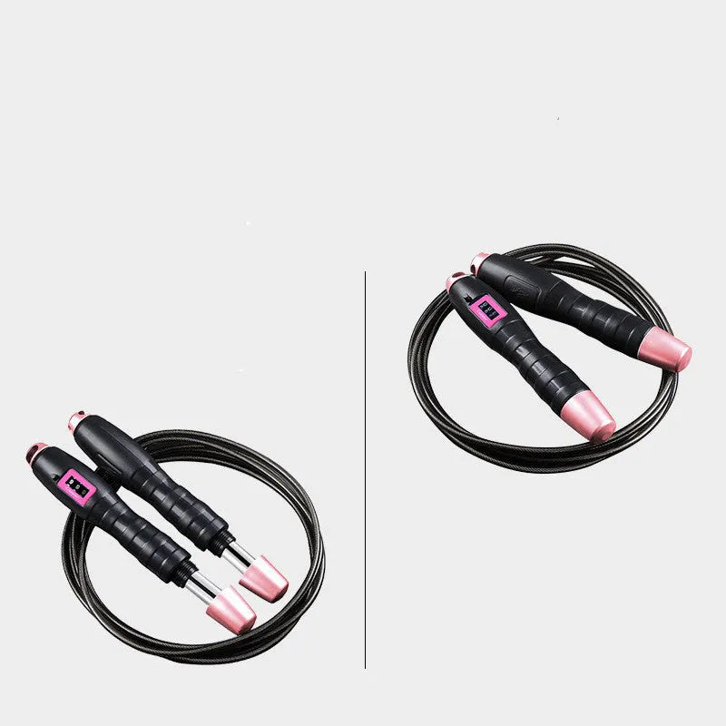 Adjustable digital skipping rope with ABS handles and TPU coated steel cable in black and pink for fitness exercise.