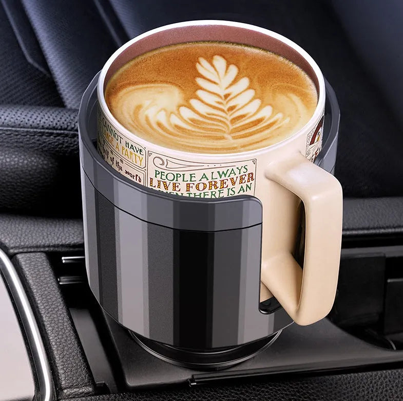Matte black adjustable car cup holder expander for large bottles and cups on a car centre console