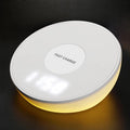White wireless phone charger with digital clock display and control buttons