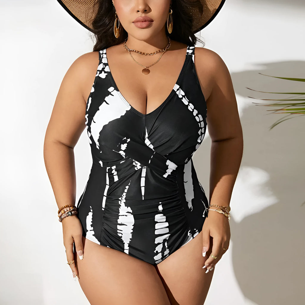 Black conservative one-piece swimsuit with sleeveless design and high-elasticity polyester construction