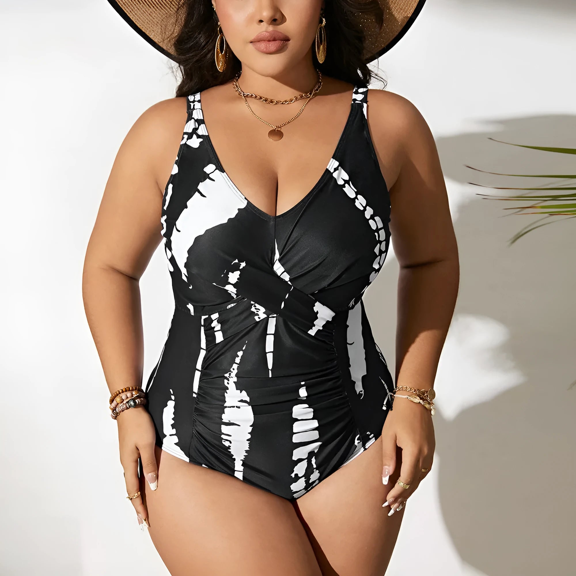 Black conservative one-piece swimsuit with sleeveless design and high-elasticity polyester construction