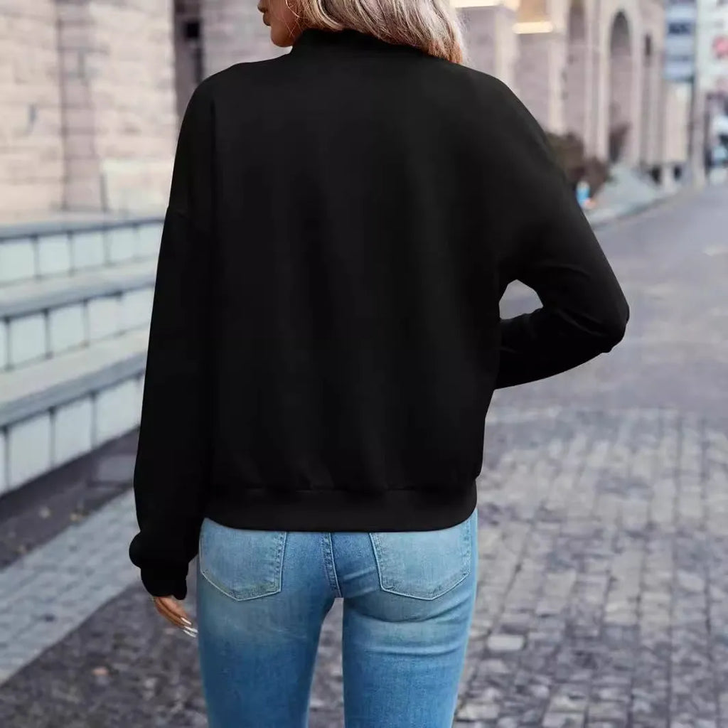 Black women's casual zip-up jacket with long sleeves and faux pockets