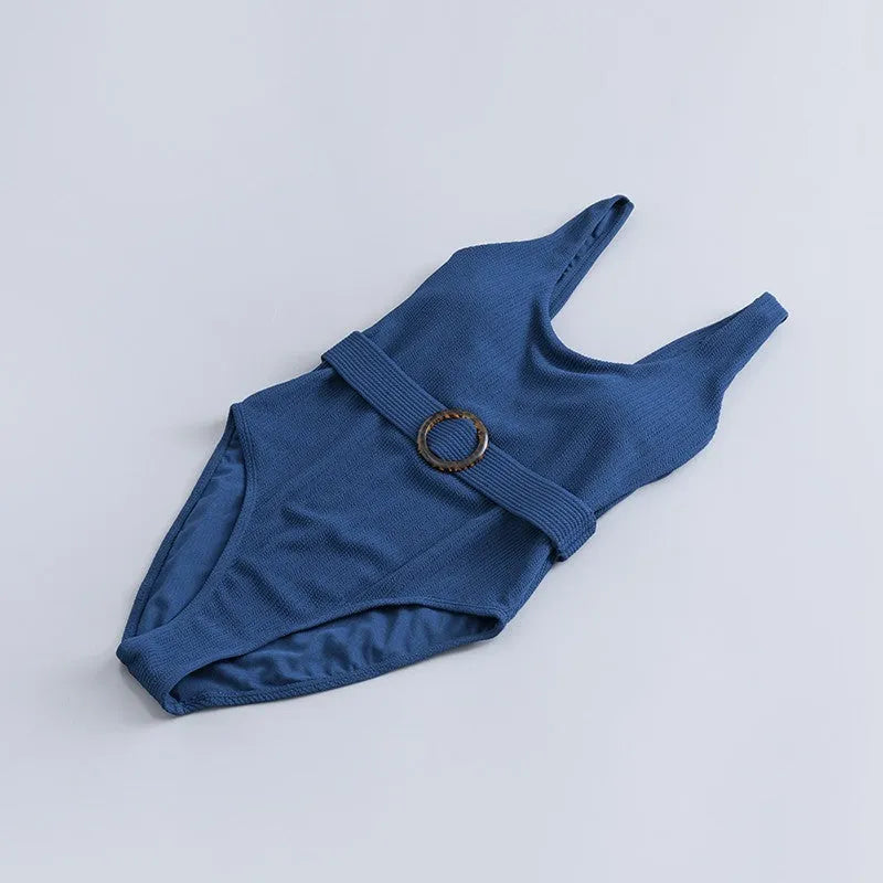 Navy blue women's one-piece triangle swimsuit with chest pads and sleeveless design