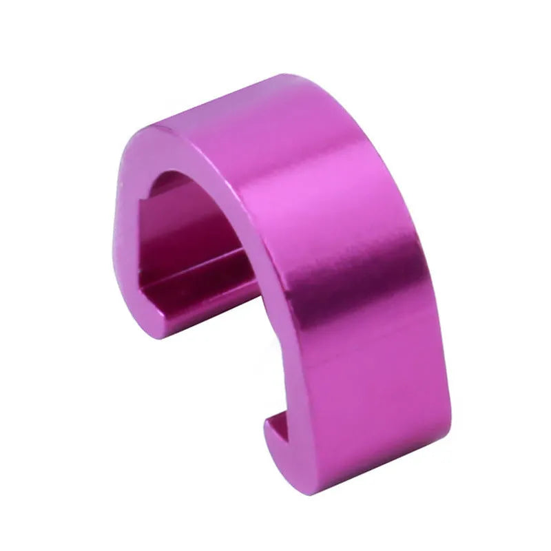 Set of ten small aluminium alloy C-shaped buckles in assorted colours on a white background.
