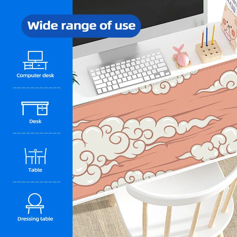 Large cloud pattern desk mat with natural rubber non-slip base on a wooden desk