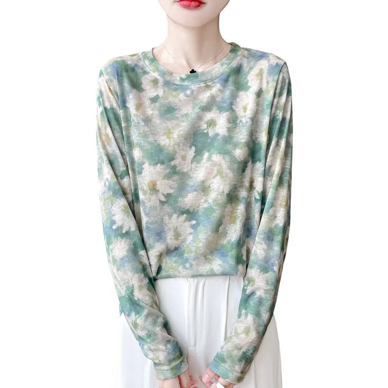 Women's round neck pullover top in a floral print Tencel cotton knitted fabric.