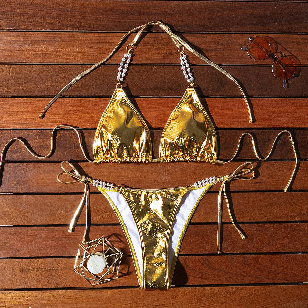 Gold halter lace-up bikini swimsuit with pearl chain fastening on the back