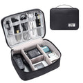 Black electronics organizer travel cable bag with removable dividers, mesh pockets, and a top handle