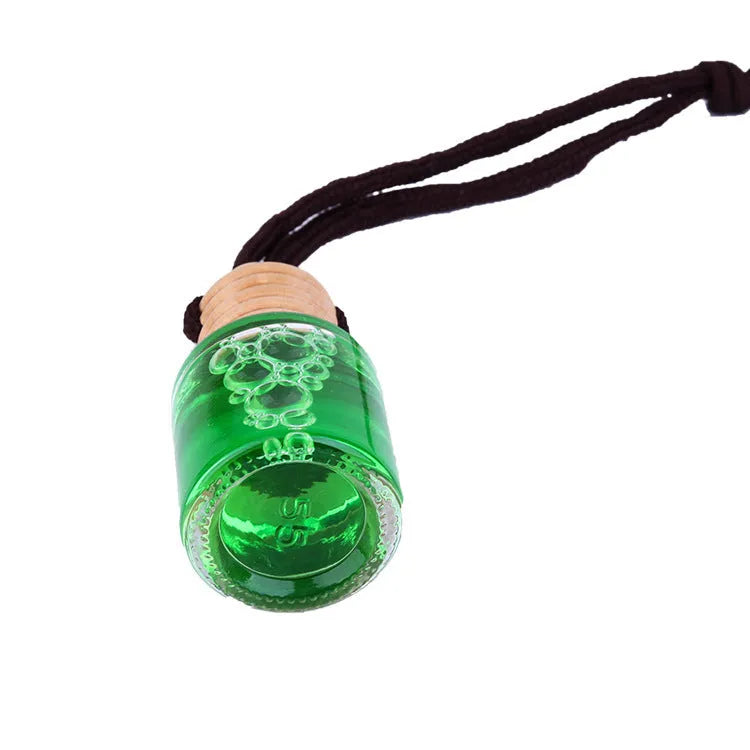 Car air freshener glass bottle hanging ornament showing scent options: Lavender, Lemon, Apple, Strawberry, Ocean, Floral.