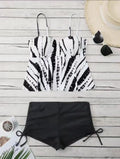 Women's geometric print split bikini swimsuit in blue, shown as a top and shorts set.