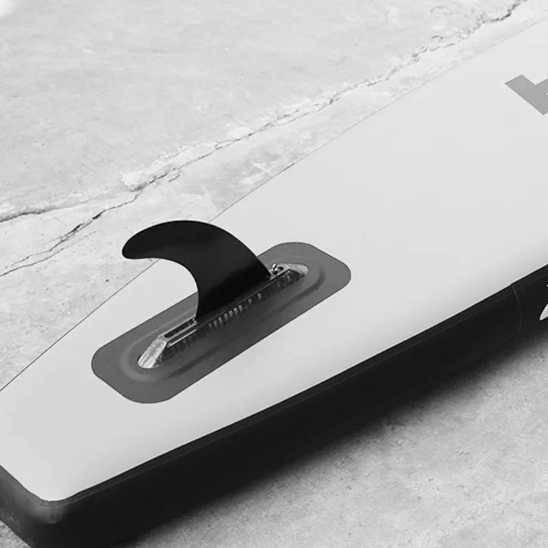 Heytur SUP paddle with large removable plastic fish fins for water dispensing, showing the complete unit.