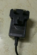 Charging hair clippers with stainless steel cutter head and EU, UK, US plug adapters for adults and children
