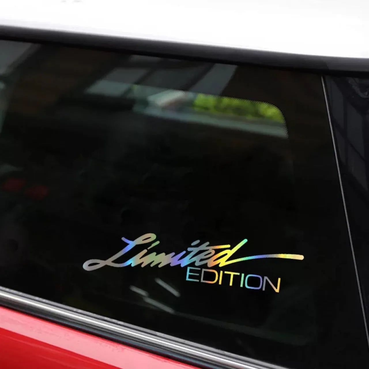 Black laser reflective text car sticker on PET material for vehicle body application.