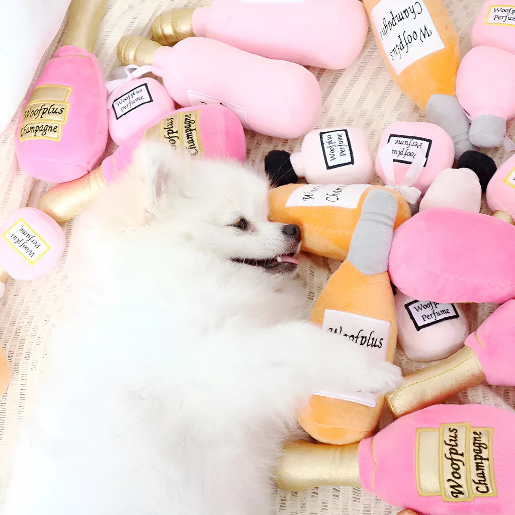 Soft plush pet toy in the shape of a wine bottle, shown in various colours.