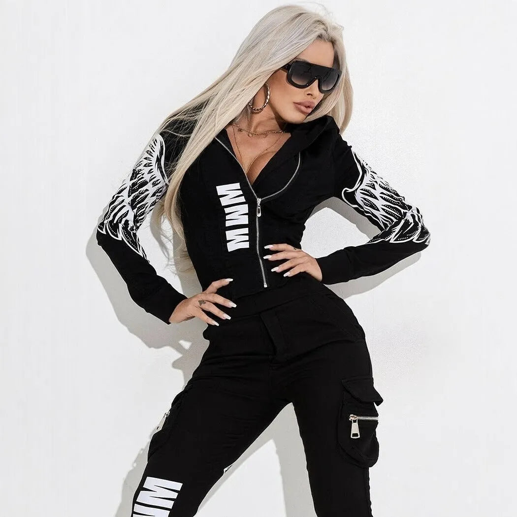 Black women's printing zip hooded casual suit with matching trousers on a hanger.