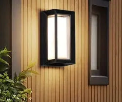 Outdoor wall mounted lamp with acrylic shade and aluminium body, suitable for garden and exterior lighting with IP65 waterproof rating.