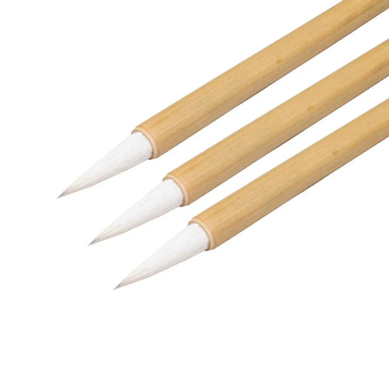 Chinese painting brush set with Yang Hao Jia Jian nib and bamboo handle in three sizes laid on table