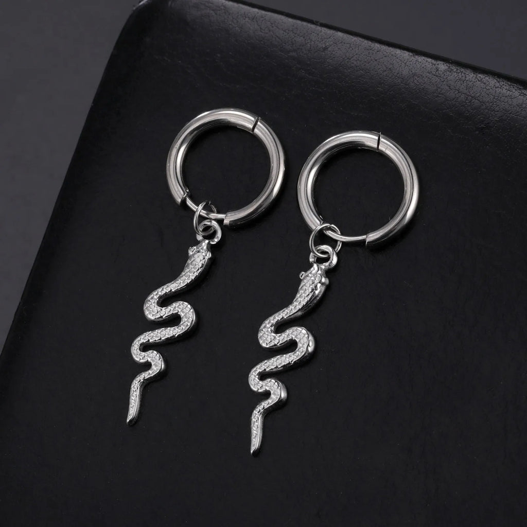 Gold plated stainless steel snake-shaped vintage earrings with ear clip fastening