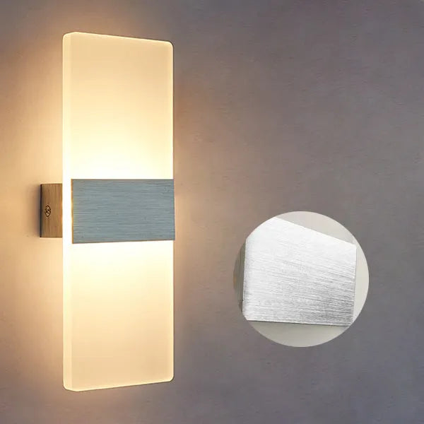 Modern acrylic wall lamp in silver finish with LED light, showing warm and white light settings.