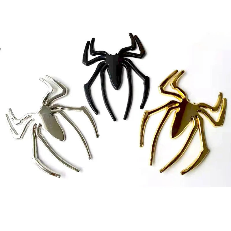 Three-dimensional metal spider car sticker in zinc alloy on a vehicle bumper.