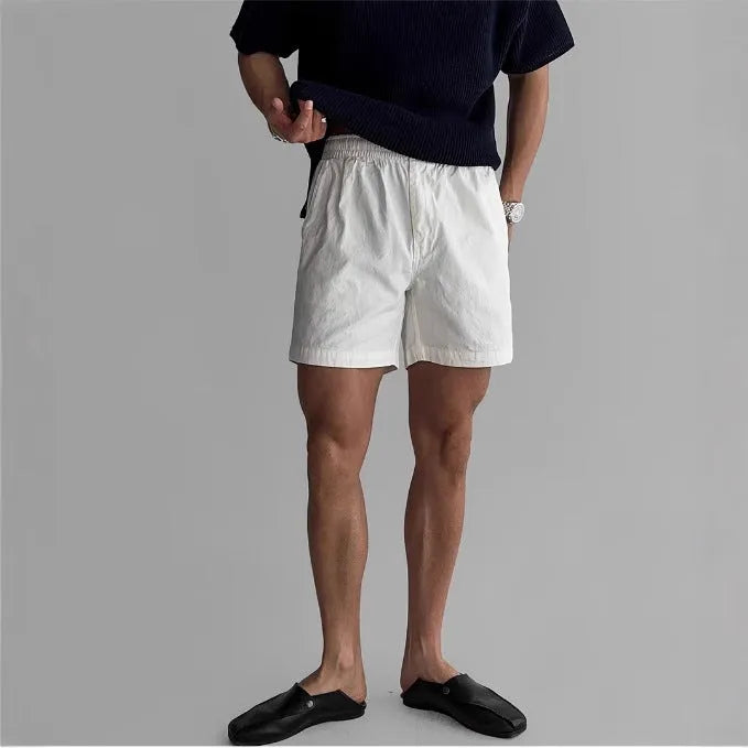 Cotton sports shorts in black colour with loose fit design for summer sports activities