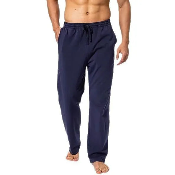 Men's loose fit casual trousers in black polyester fabric on a hanger.