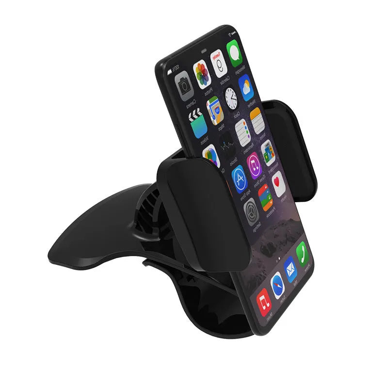 Black dashboard car phone holder mounted on a car dashboard edge, holding a smartphone.