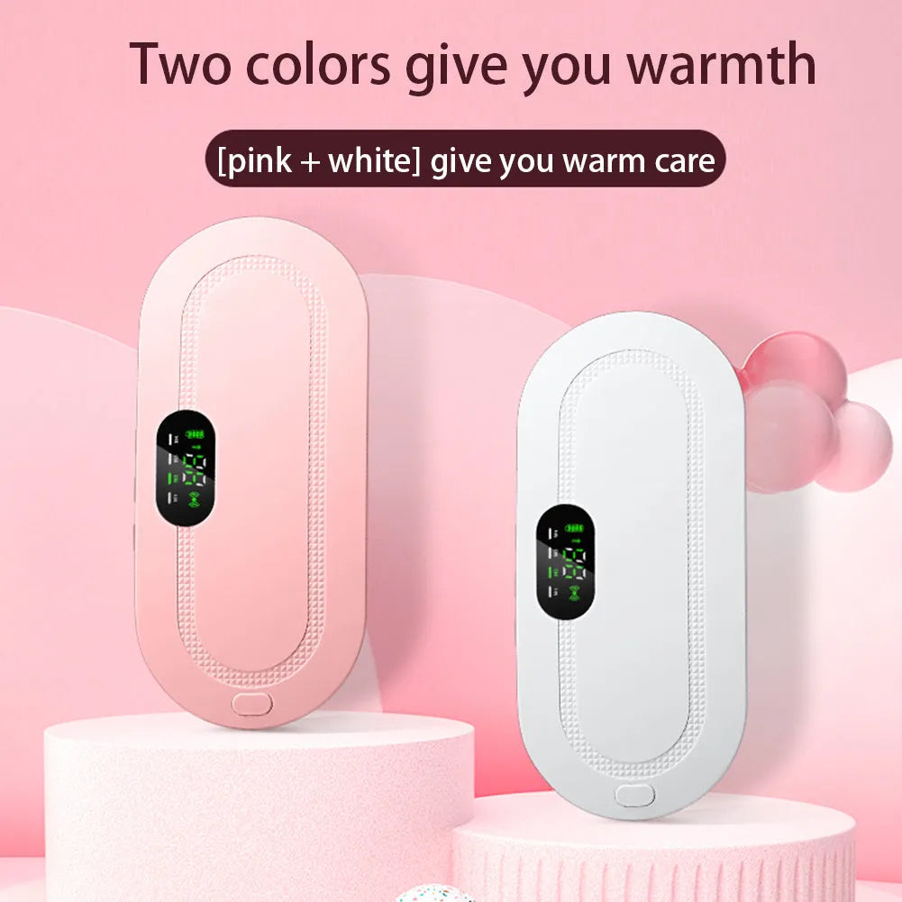 Pink and white menstrual heating belt with USB charger, controller, and long cable on a grey background.