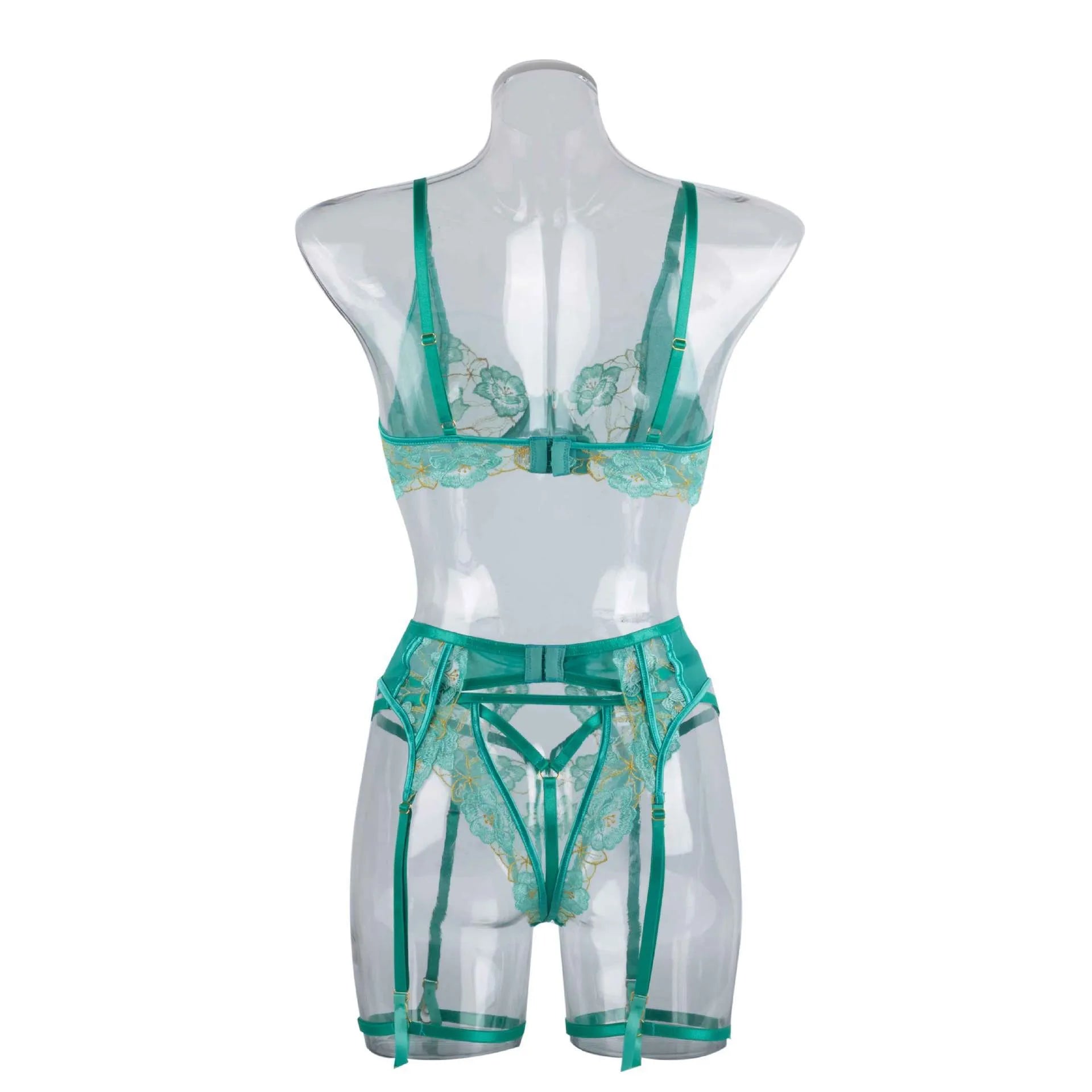 Light green women's embroidered bra and matching briefs set on a white background.