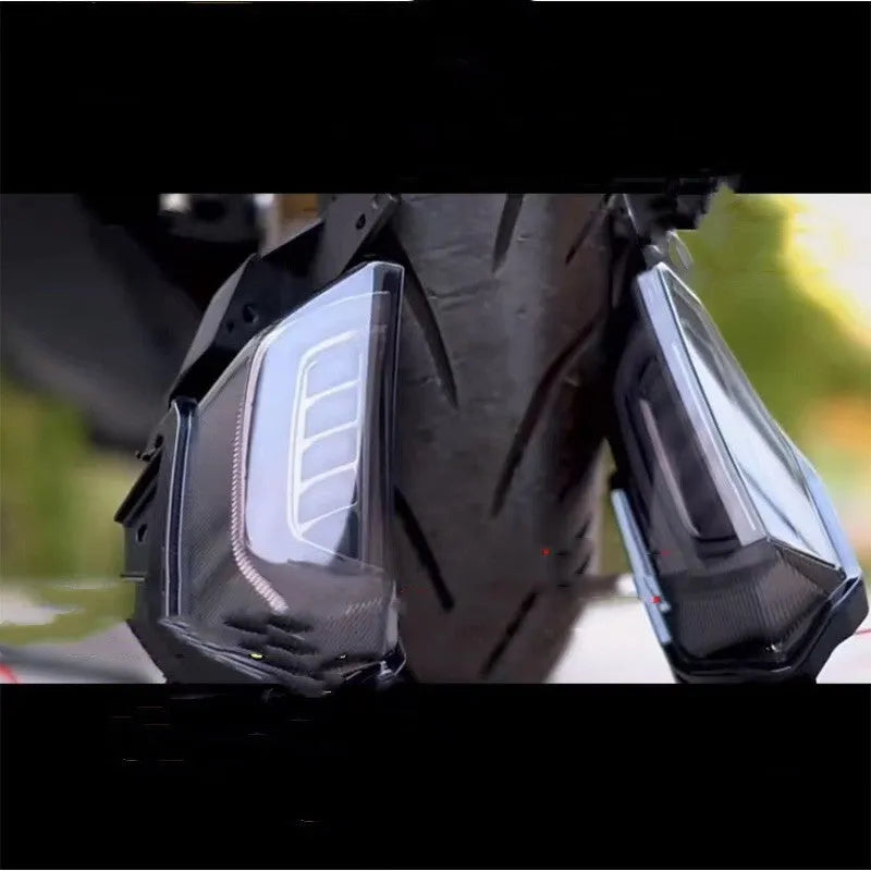 Pair of LED turn signal lights for Yamaha NMAX155 scooter in blue-yellow colour.