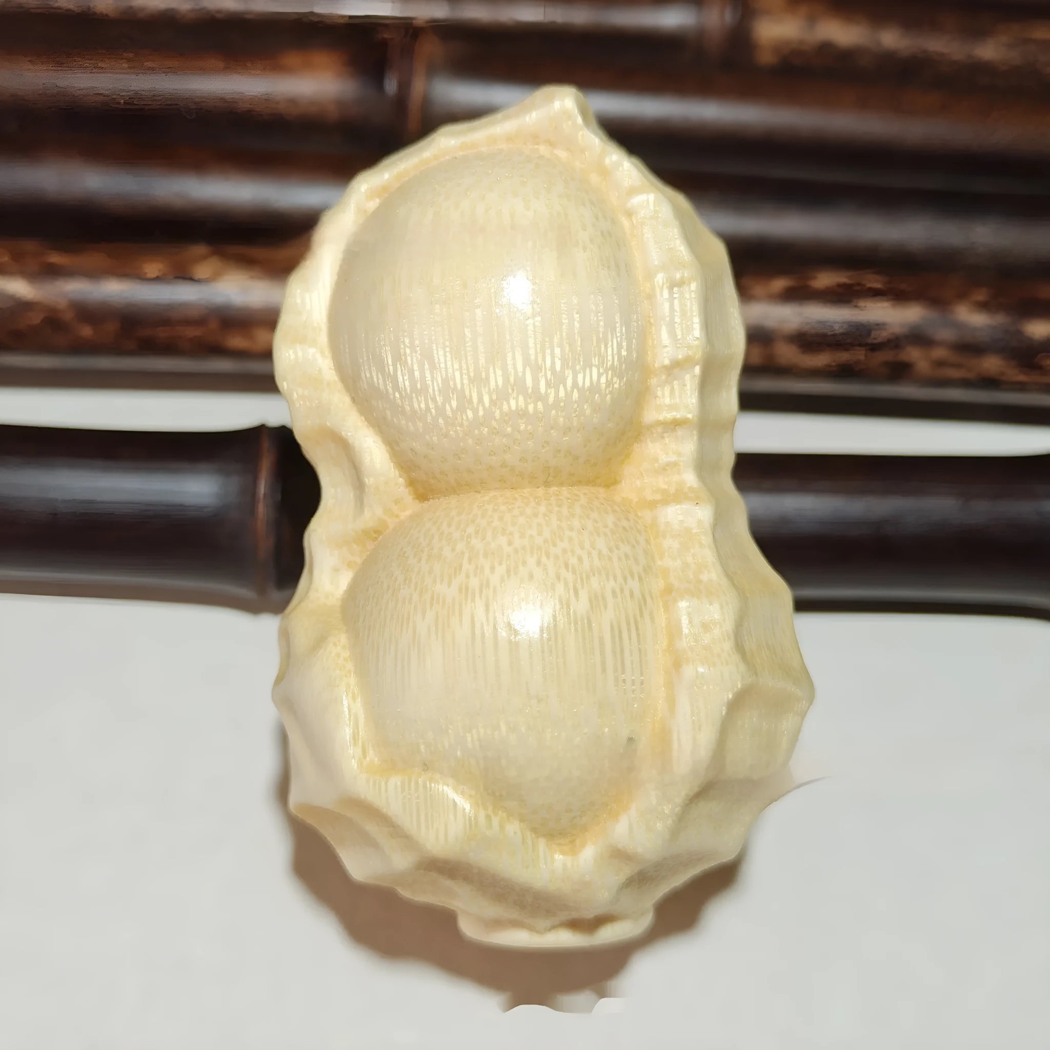 Solid bamboo carving peanut ornament with good things may happen inscription modern simplicity design