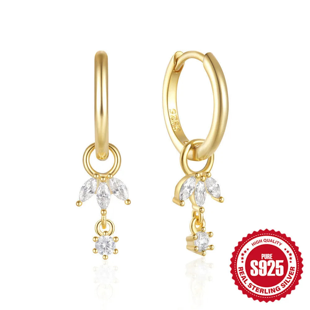 Golden S925 sterling silver earrings with geometric sunflower design and inlaid zircon stones.