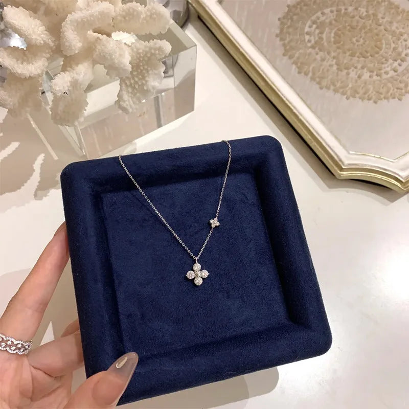 925 sterling silver clover necklace with flower pendant in white gold finish and O-shaped chain