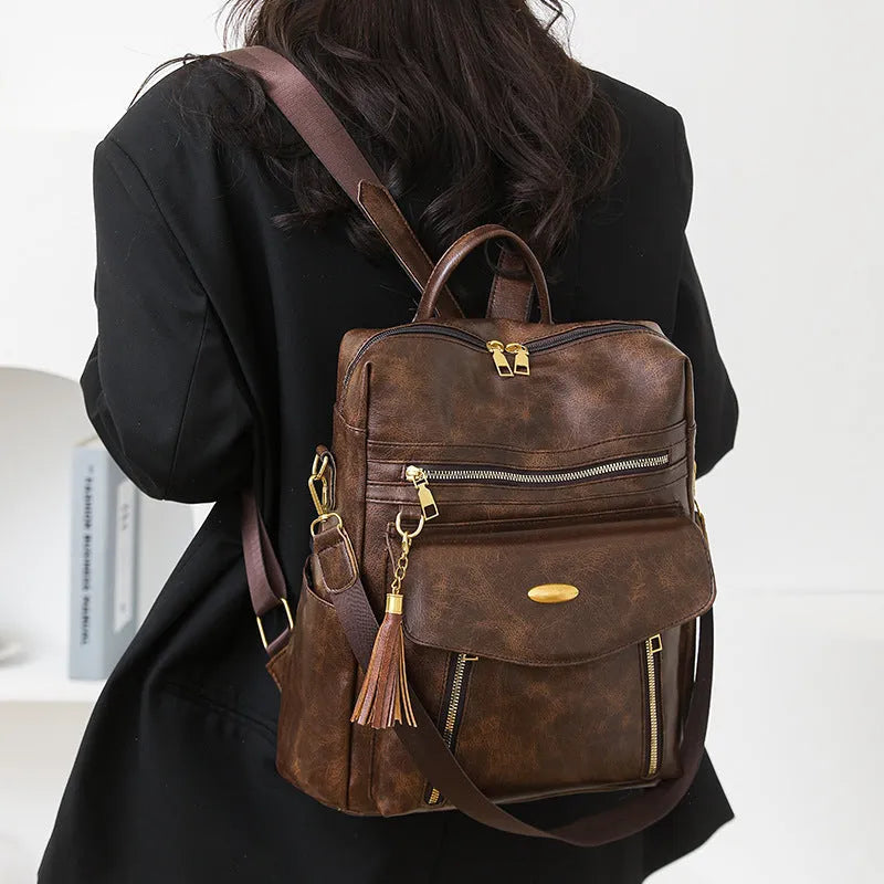 Crossbody casual ladies backpack in brown PU with sewing thread design and phone pocket