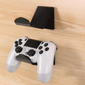 Universal game controller wall mount bracket in black colour shown mounted on wall