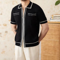 A man's slim-fit short-sleeved polo shirt with a lapel collar, shown in black and white.
