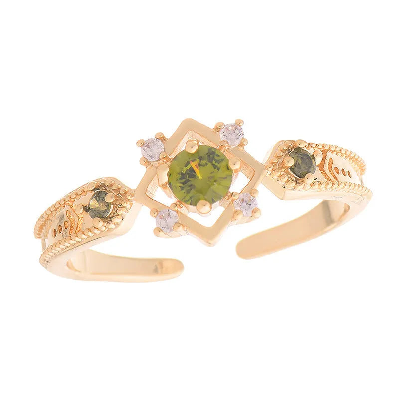 French design copper open mouth ring with purple zircon stones in geometric setting